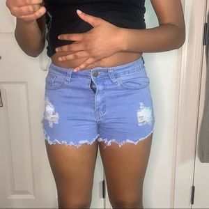 Blue distressed shorts
